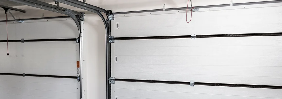 Fix Folding Garage Door Jerking in Lake Worth