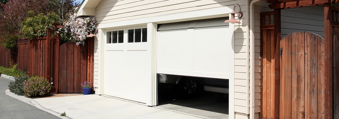 Fix Metal Garage Door Jerking in Lake Worth